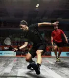  ?? PHOTO: REUTERS ?? New Zealand squash player Paul Coll in action against Wales' Emyr Evans yesterday.