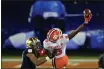  ?? BRIAN BLANCO — THE ASSOCIATED PRESS ?? Clemson wide receiver E.J. Williams (6) hauls in a pass with one hand in front of Notre Dame cornerback Clarence Lewis (26) for a gain of 22 yards during the second half of the Atlantic Coast Conference championsh­ip game Saturday in Charlotte, N.C.