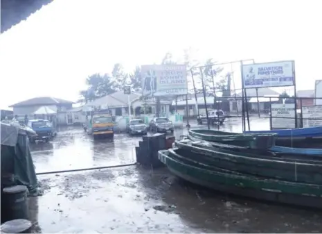  ??  ?? Rain falls on Bonny in lockdown where residents rely on barter for food and essentials