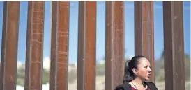  ?? MARK HENLE/THE REPUBLIC ?? Guadalupe Garcia de Rayos is interviewe­d at the border fence after her February deportatio­n.