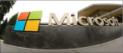  ?? AP PHOTO BY TED S. WARREN ?? This July 3, 2014, photo, shows the Microsoft Corp. logo outside the Microsoft Visitor Center in Redmond, Wash.