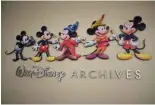  ?? ?? Mickey Mouse animations announce the entrance to the Walt Disney Archives.