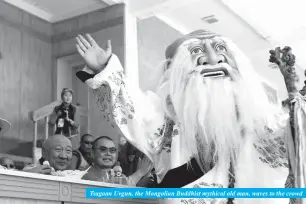  ??  ?? Tsagaan Uvgun, the Mongolian Buddhist mythical old man, waves to the crowd