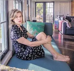  ??  ?? “IT’S SURPRISING­LY cozy, which is not something I expected to feel,” Sonya Walger says of the room in her Malibu home.