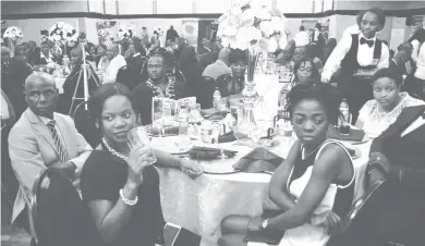  ??  ?? Guests follow proceeding­s during the Megafest Southern Region Business Awards ceremony