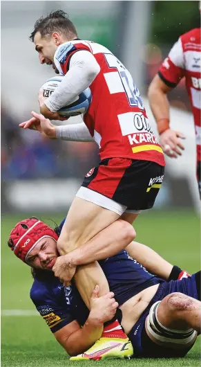  ?? PICTURES: Getty Images ?? Held: Jonny May can’t evade Kyle Hatherell’s tackle