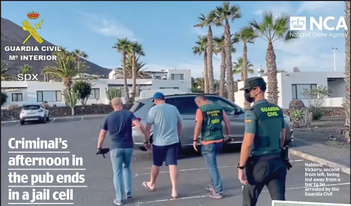  ?? ?? Nabbed: Vickery, second from left, being led away from a bar to be arrested by the Guardia Civil