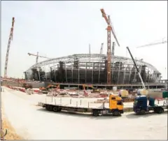  ?? KARIM JAAFAR/AFP ?? A general view taken with a fisheye lens on February 6, shows constructi­on work in Qatar.