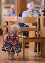  ?? GARY NYLANDER/The Daily Courier ?? Hazel Dale, 11 months, surveys her surroundin­gs in the renovated sanctuary.