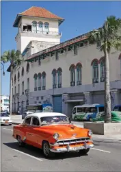  ?? Katharine Lotze/Signal ?? Classic American cars are common in Cuba, not just Havana. They’re maintained delicately, with parts from foreign cars, like Polskis and Russian cars, sometimes even lawn mower parts sometimes. To be a mechanic in Cuba is more like being a...