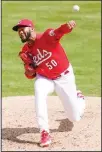  ??  ?? Cincinnati Reds relief pitcher Amir Garrett (50) throws during the ninth inning of a baseball game against the Pittsburgh Pirates at Great American Ball Park in Cincinnati on April 7. (AP)