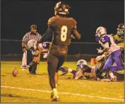  ?? PHOTO BY MIKE RUDY ?? Lackey’s Nathan Proctor recovers a Patuxent fumble deep in Patuxent territory to set up a Chargers’ field goal in Lackey’s 3-0 win at Patuxent on Friday night.