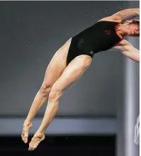  ?? Brett Coomer photos / Houston Chronicle ?? Laura Wilkinson travels to College Station once a week to work out on the 10-meter platform at Texas A&M as she continues her quest to compete in a fourth Olympics.