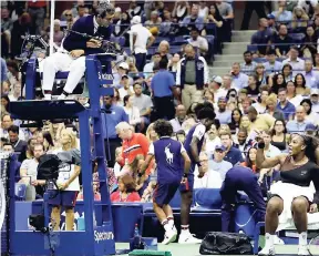  ?? AP ?? Serena Williams argues with chair umpire Carlos Ramos during a changeover in the US Open women’s singles final against Naomi Osaka in New York yesterday.