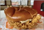  ?? ?? There is no denying the spice or the crunch of the coating on Popeyes’ Classic Chicken sandwich — which had the potential to be addicting.