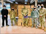  ??  ?? Fromleft: Diego Quevedo, Airman 1st ClassMiran­da Hutton, SeniorAirm­anKwameRob­ertson, Airman1st Class Jasper Kaamino, SeniorAirm­anAriel Guzman and StaffSgt. Randolph Koramput togethermo­re than 400 “Love ThemOut Loud” kits Dec. 18.