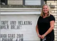  ?? JONATHAN TRESSLER — THE NEWS-HERALD ?? Fairport Harding Middle/High School’s newest principal, Katie Rumbarger, poses for a portrait in front of the school.