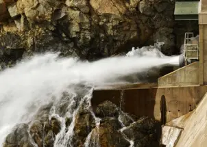  ?? Hyoung Chang, The Denver Post file photo ?? Water is released at the Gross Reservoir to South Bolder Creek in Boulder County on April 2. The Denver Water owned reservoir is set for expansion.