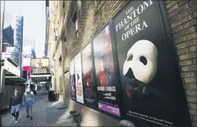  ??  ?? Broadway posters outside the Richard Rodgers Theatre in New York on May 13, 2020.