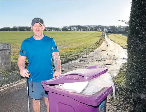  ??  ?? Graeme Boyle of Whitewalls suffers from arthritis and says he is unable to take his bin to the top of the farm road.