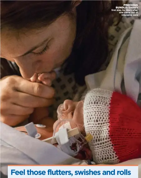  ??  ?? PRECIOUS BUNDLE: Emma’s first kiss for Mary after she came out of
intensive care