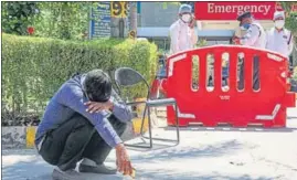  ?? PTI ?? A man breaks down after a relative died at the Jaipur Golden hospital in Rohini on Saturday.