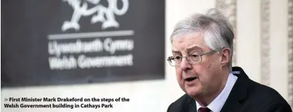  ??  ?? > First Minister Mark Drakeford on the steps of the Welsh Government building in Cathays Park