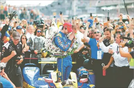  ?? Jonathan Ferrey Getty Images ?? ALEXANDER ROSSI originally set out to race in Formula One but he’s glad to be on the IndyCar circuit after winning the 100th Indy 500.