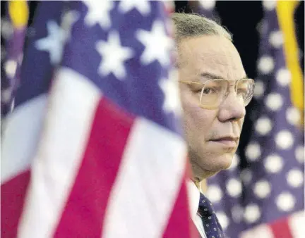 ?? (Photo: AP) ?? In this February 15, 2001 file photo, Secretary of State Colin Powell looks on as President Bush addresses State Department employees at the State Department in Washington