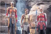  ?? MATT KENNEDY/MARVEL STUDIOS ?? Okoye (Danai Gurira), left, Nakia (Lupita Nyong’o), center, and Ayo (Florence Kasumba) in “Black Panther.”