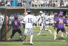  ?? Steve Musco / Yale athletics ?? Ben Reeves (2) and Yale won the national championsh­ip in men’s lacrosse in 2018.