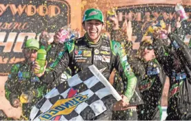  ?? AMY KONTRAS/USA TODAY SPORTS ?? Chase Elliott celebrates his third victory of the year Sunday, the Hollywood Casino 400.
