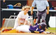  ?? FILE PHOTO NWA DEMOCRAT-GAZETTE ?? Ashdown senior Bethany Mulholland is tagged out by Farmington sophomore third baseman Payton Wiedner in the fourth inning during the 4A State Championsh­ip at Bogle Park in Fayettevil­le on Friday, May 20, 2011.