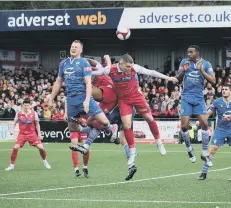  ?? ?? HEADS WE WIN: Bailey Gooda goes up for a header