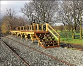  ?? PHOTOS BY EVAN BRANDT — DIGITAL FIRST MEDIA ?? The state has ruled that the constructi­on of a permanent platform for the Colebrookd­ale Railroad to replace the temporary one will further violate the terms of the federal funding that purchased Memorial Park.