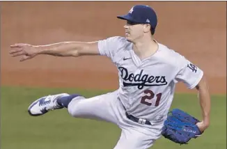  ?? WALKER BUEHLER Harry How Getty I mages ?? leaned heavily on a four- seam fastball that averaged 97.2 mph and touched 99 mph, throwing his heater 41 times against the Oakland Athletics at Dodger Stadium.