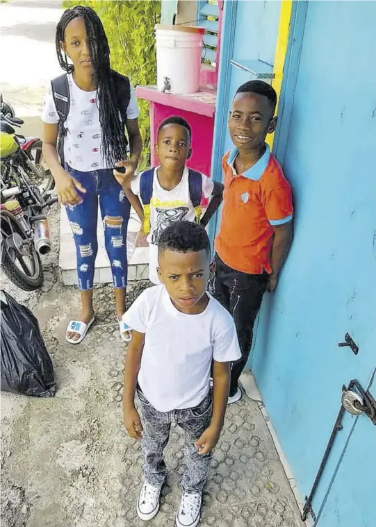  ?? ?? Thirteen-year-old Adrianna Laing (back left), who has been hospitalis­ed after a fire that claimed the lives of her three younger brothers — seven-year-old Jayden Laing and his twin Jorden, as well as eight-year-old Adrianno Laing (back right) —poses with the three siblings in earlier times.