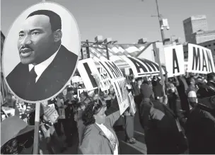  ??  ?? People gather for events commemorat­ing the 50th anniversar­y of the assassinat­ion of the Rev. Martin Luther King Jr. on Wednesday in Memphis, Tenn. King was assassinat­ed April 4, 1968, while in Memphis supporting striking sanitation workers.