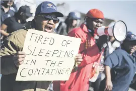  ?? Picture: Jacques Nelles ?? BACK-UP. An EFF member joins striking Gautrain workers in Midrand yesterday.