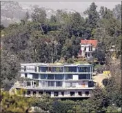  ?? Genaro Molina Los Angeles Times ?? DEVELOPER Mohamed Hadid and his attorneys say tearing down the unfinished home in Bel-Air would be impractica­l and a burden on the neighborho­od.