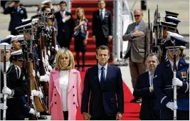  ?? WIN MCNAMEE / GETTY IMAGES ?? French President Emmanuel Macron and his wife Brigitte arrive at Andrews Air Force Base on Monday in Maryland. Macron has come to the United States on the fifirst state visit hosted by the Trump White House.