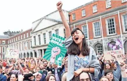  ?? PETER MORRISON/AP ?? A woman from the “Yes” campaign reacts after the final result was announced Saturday of an Irish referendum on allowing some abortions.