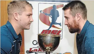  ?? CLIFFORD SKARSTEDT EXAMINER ?? Maple Ridge Burrards assistant captain Mike Mallory, left, stares down Peterborou­gh Century 21 Lakers captain Robert Hope during the 2018 Mann Cup press conference Thursday at the Best Western Otonabee Inn.