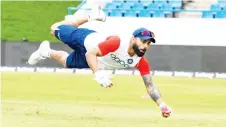  ?? — AFP photo ?? Virat Kohli takes part in a training session one day ahead of the 1st Test between West Indies and India at Vivian Richards Cricket Stadium, North Sound, Antigua in this Aug 21 file photo.