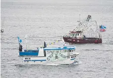  ?? ?? Fishing crews protest in Teesport, Middlesbro­ugh, over the mass deaths.