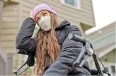  ?? LAUREN PETRACCA/THE NEW YORK TIMES ?? Heather Carr, who has been devastated by the physical and cognitive effects of long COVID-19, is seen Wednesday in Syracuse, N.Y.