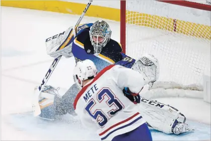  ?? ASSOCIATED PRESS FILE PHOTO ?? Blues goaltender Jordan Binnington defends the net as Montreal Canadiens’ Victor Mete shoots Jan. 10 in St. Louis.