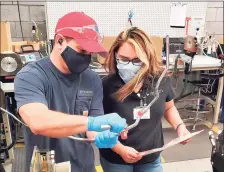  ?? Contribute­d photo / Middlesex Community College ?? Middlesex Community College student Elizabeth Moag is shown at Pegasus Manufactur­ing in Middletown. The school recently received $12,500 in grants from the Gene Haas Foundation, which will be awarded to precision manufactur­ing students.