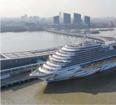  ?? ?? An aerial drone photo taken on January 1 shows the large domestic cruise ship Adora Magic City