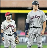  ?? AP/YI-CHIN LEE ?? New York Yankees outfielder Aaron Judge (right) and Houston second baseman Jose Altuve were elected as starters for the American League in the Major League Baseball All-Star game.